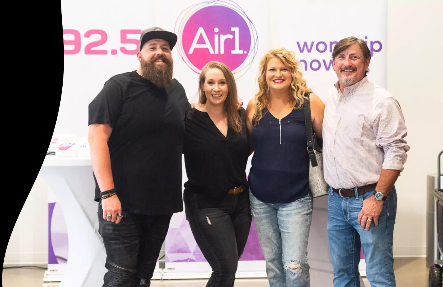 air1 djs ashton and careth smiling with fans